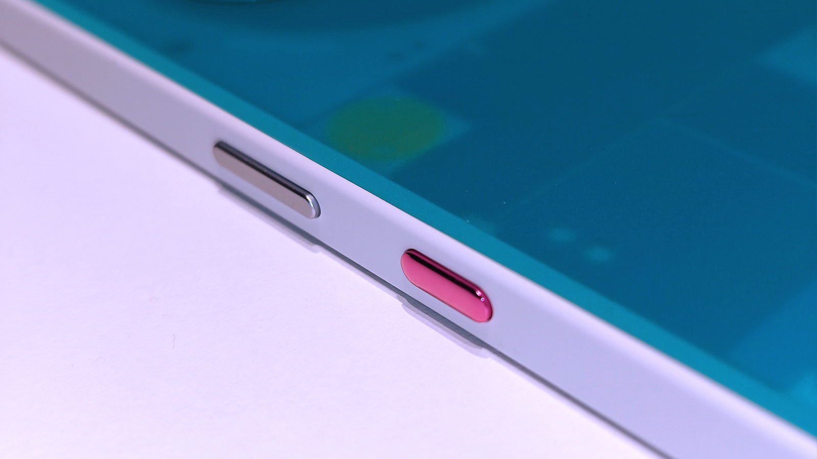 Nothing 3a Community Edition, a green phone on a white table