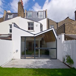 house exterior with white wall and glass door