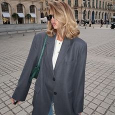 Saasha Burns wearing a grey blazer