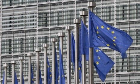 EU flags fly at the European Commission headquarters in Brussels. On Friday, the Nobel Peace Prize was awarded to the European Union for its part in helping &amp;quot;to transform a once torn Europe f