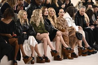 US born British actress Sienna Miller, US actress Kiernan Shipka and British-US model Georgia May Jagger and her mother US actress and model Jerry Hall sit ahead of the presentation of creations by Chloe for the Women Ready-to-wear Fall-Winter 2024/2025 collection as part of the Paris Fashion Week, in Paris on February 29, 2024.