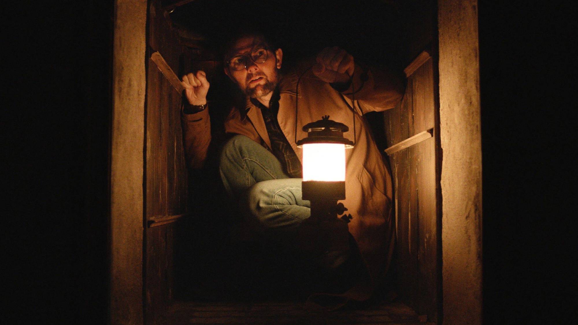 Adam Scott as Ohm Bauman in "Hokum"