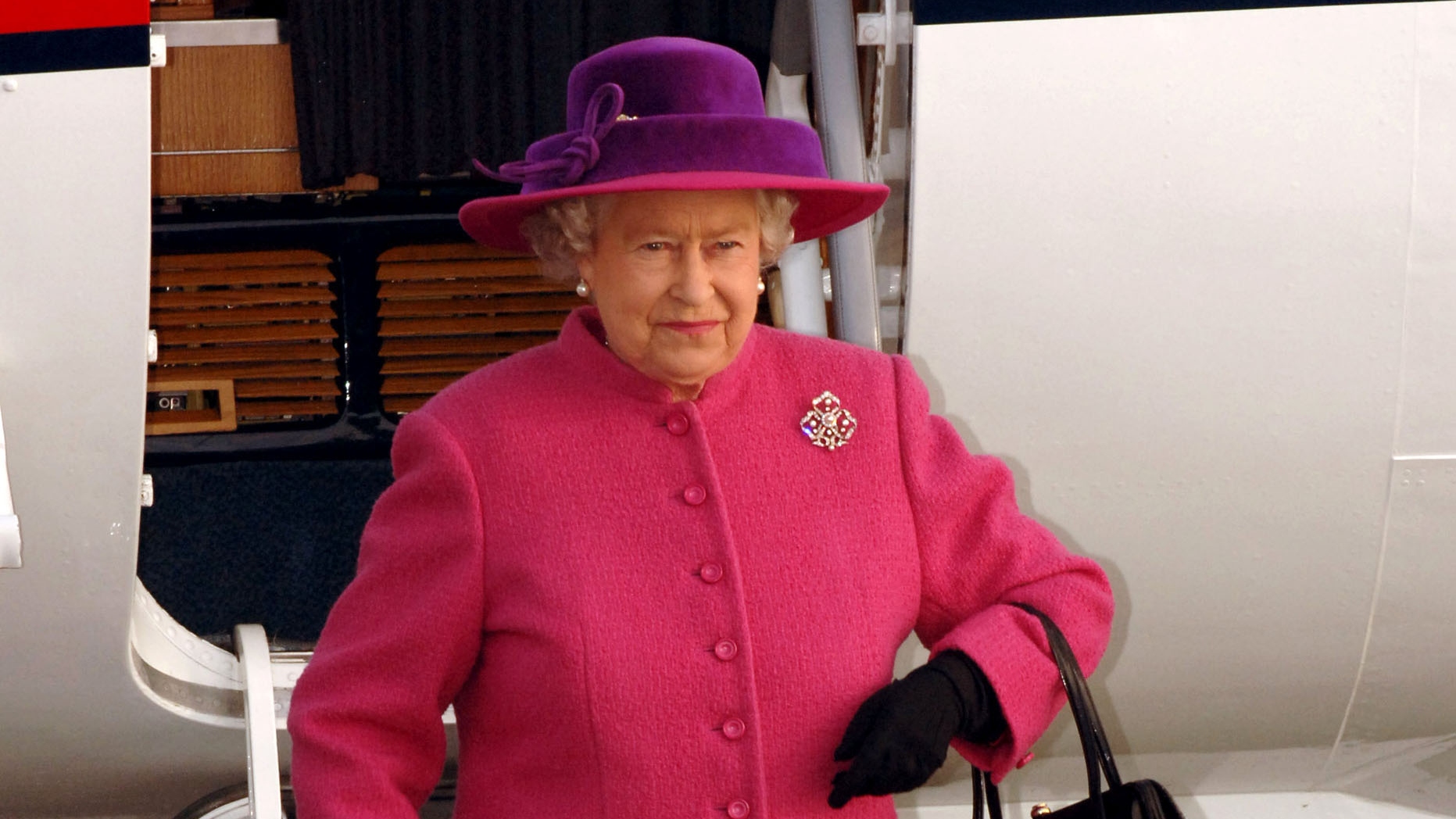 Queen Elizabeth ll arrives by plane to watch a flypast at RAF Coltishall for its 65th birthday on November 17, 2005