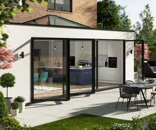 A 3D render of a white-rendered extension to a brick house. The extension features a long expanse of bifolding doors, which are semi-open