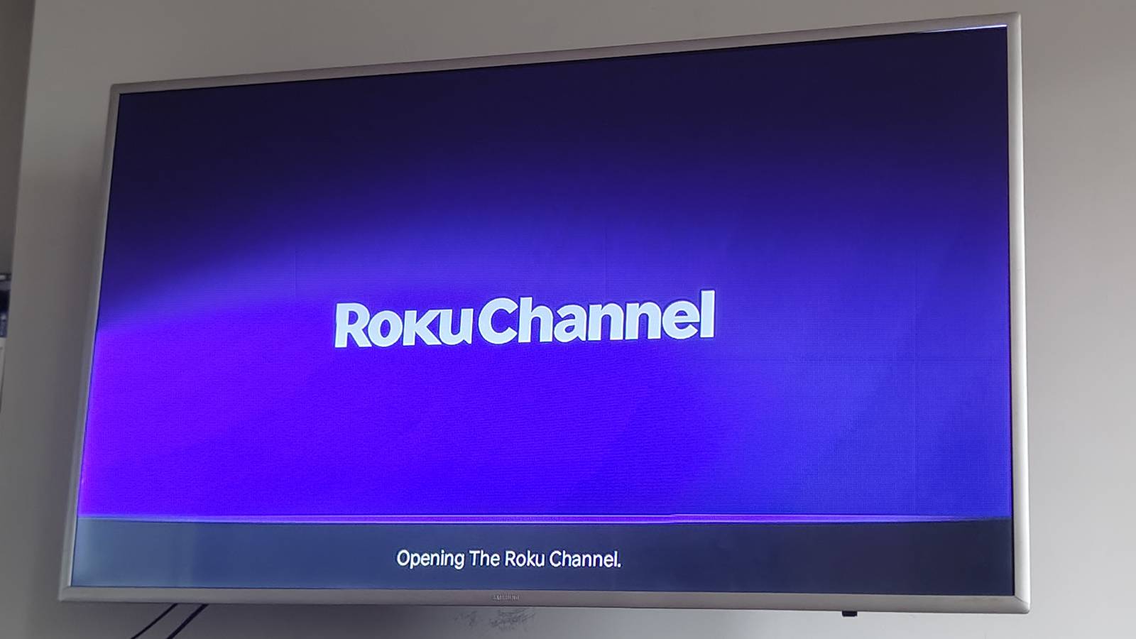 The loading page of The Roku Channel on a Roku Streaming Stick.