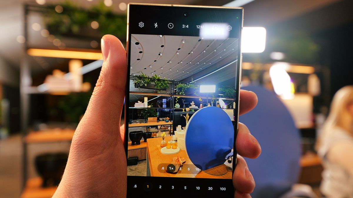 Samsung Galaxy S24 Ultra phone showing the camera app held in a hand
