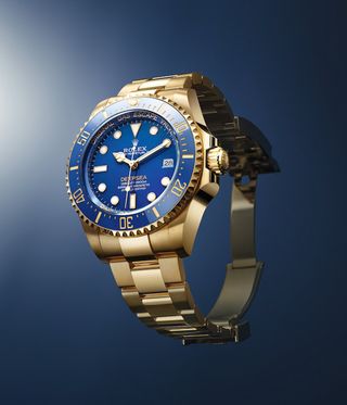 rolex blue-face gold watch