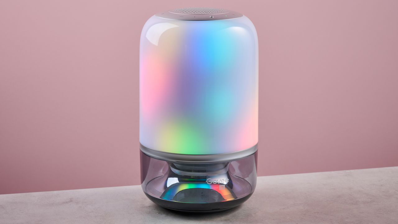 The Govee Table Lamp 2 Pro x Sound by JBL is lit up dark blue with multi-colored patches.