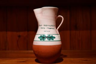 A vase with writing on the front, demonstrating the IBIS of the A7CR.