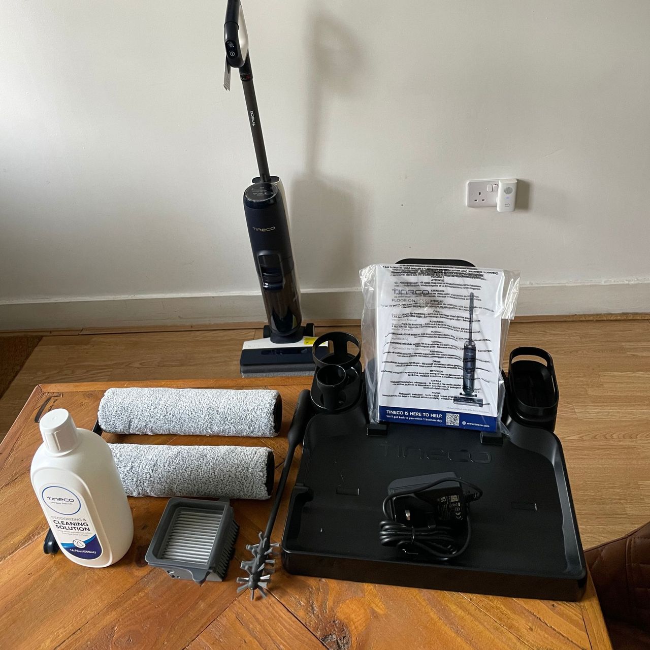 Tineco Smart Mop components laid out on a table