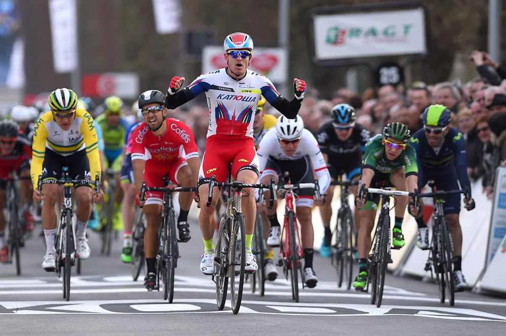Alexander Kristoff crosses the line to win stage 1.