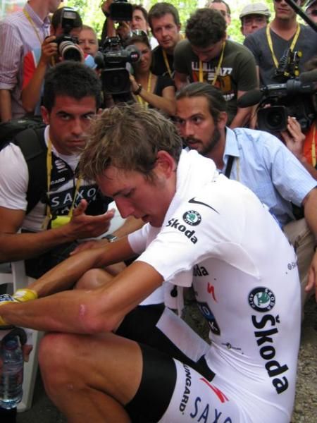 Andy Schleck tries to take it in that Alberto Contador has won the Tour de France