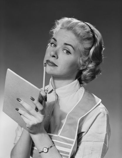 A woman making a list