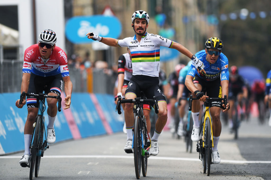Julian Alaphilippe celebrates as he wins stage 2 of Tirreno-Adriatico 2021 ahead of Mathieu van der Poel and Wout van Aert
