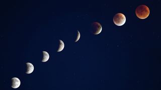 A composite image showing the different phases of a total lunar eclipse arrayed in an arc travelling from bottom left to top right.