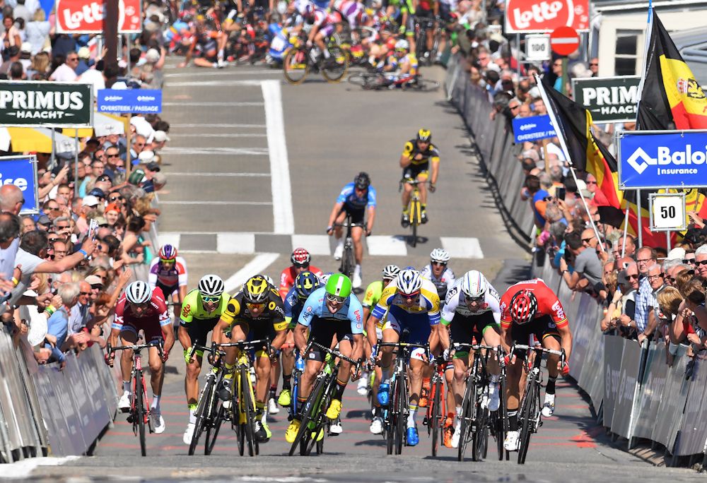 The sprinters bear down on the line while others are involved in a crash during stage 1 of the Belgium Tour