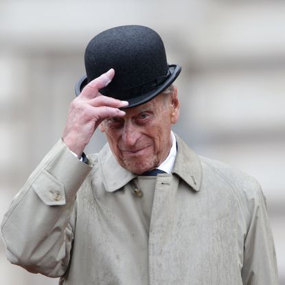 london, england august 2 prince philip, duke of edinburgh raises his hat in his role as captain general, royal marines, makes his final individual public engagement as he attends a parade to mark the finale of the 1664 global challenge, on the buckingham palace forecourt on august 2, 2017 in london, england photo by yui mok wpa poolgetty images