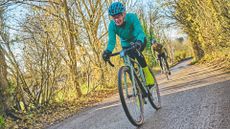 Linda Dewhurst riding gravel track