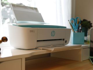 HP printer on shelf