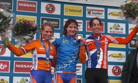 The three medal winners show off their awards.