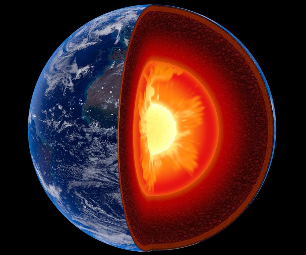 A cutout illustration showing Earth&#039;s layers, including its interior.