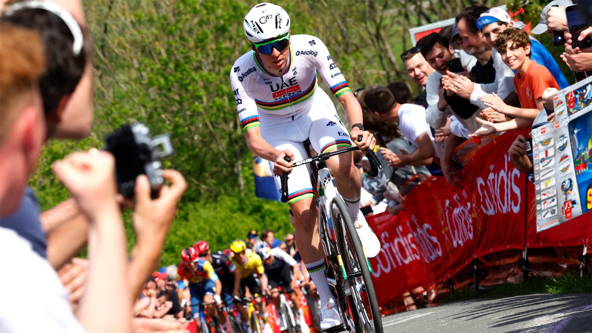 Tadej Pogacar attacks climbing the C&ocirc;te de la Redoute on his way to winning the Liege - Bastogne - Liege in 2025.