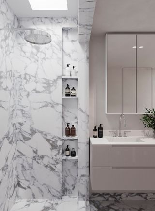 marble shower room with alcove shelving