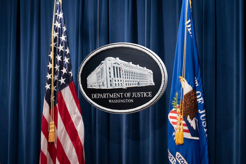 Justice Department logo.