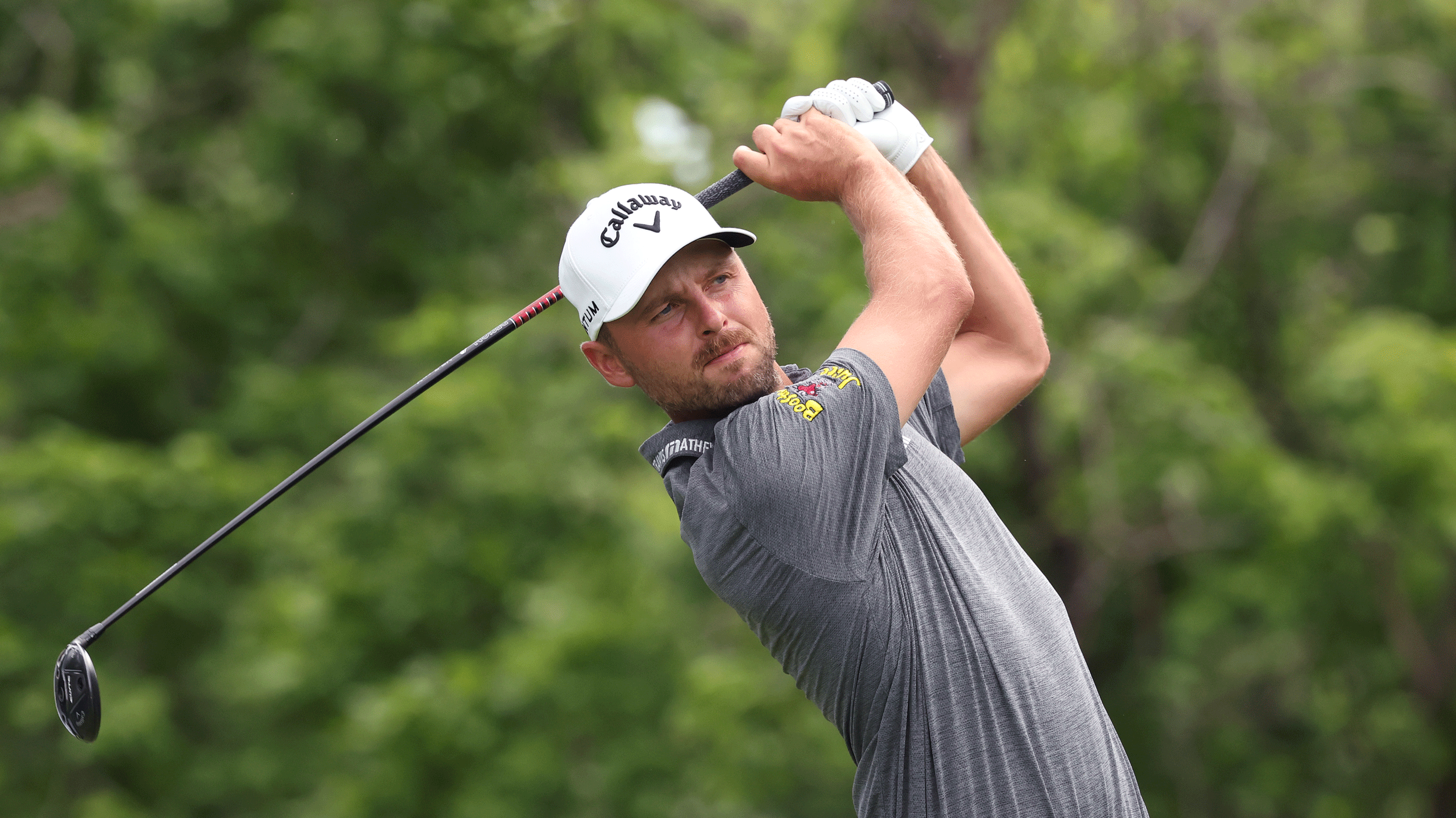 Adam Svensson hits a utility wood during the 2026 Charles Schwab Challenge