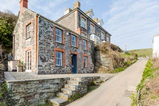 Side view of Fern Cottage which is seen on screen as Doc Martin's GP surgery