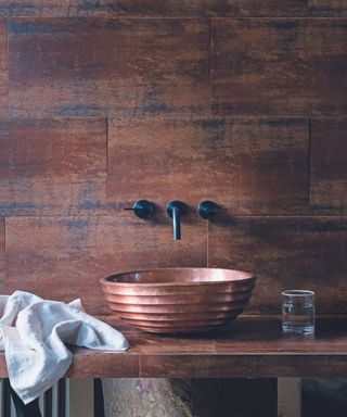 Copper tiles, copper washbasin, wall mount taps