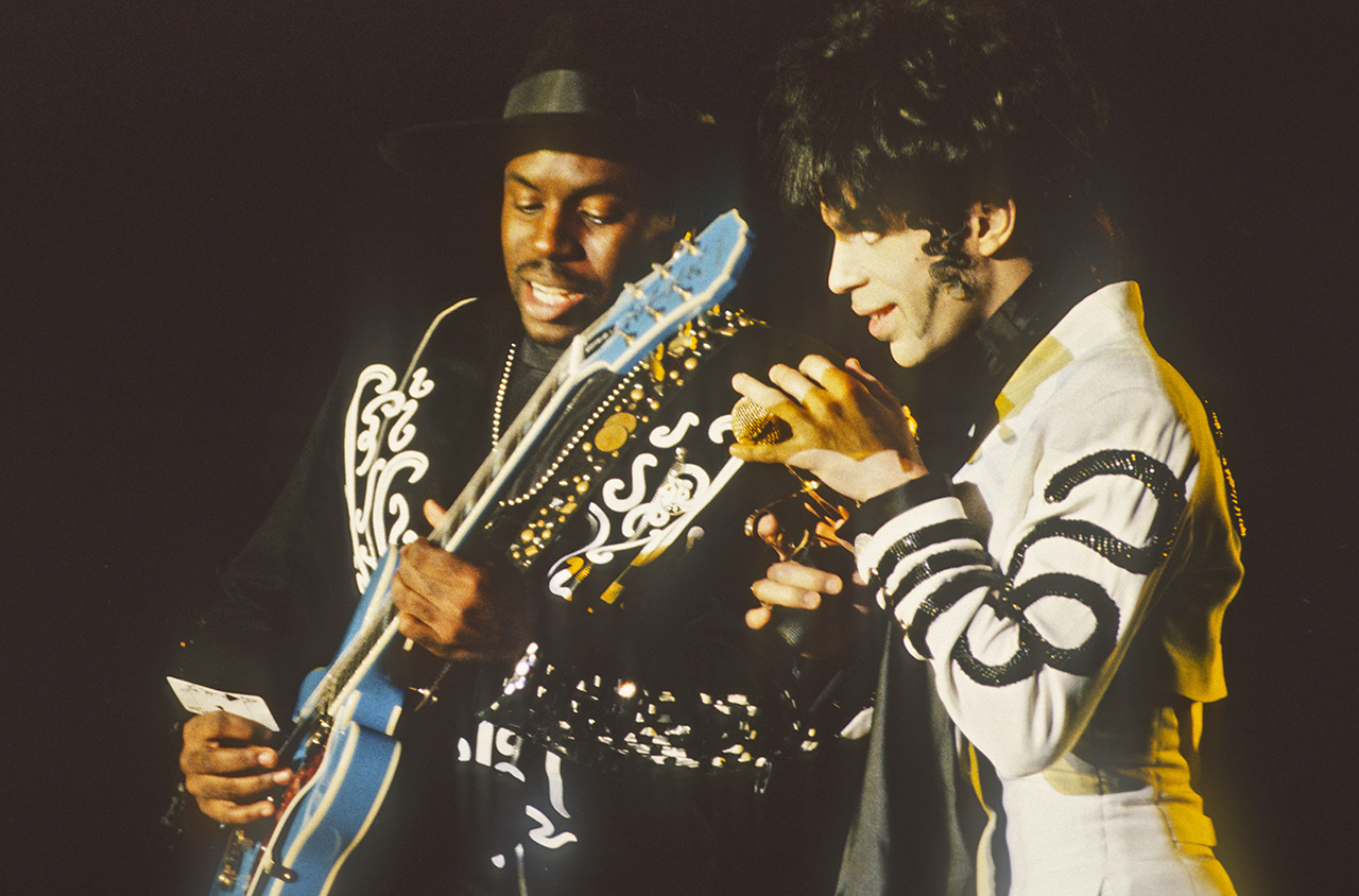 Levi Seacer Jr (left) and Prince perform onstage at the Flanders Expo in Ghent, Belgium on April 9, 1993