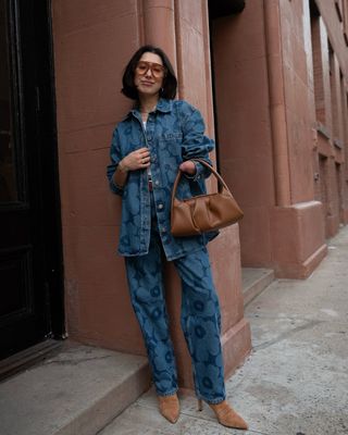 April wearing printed denim