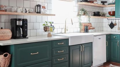 Light and bright kitchen with green cabinets
