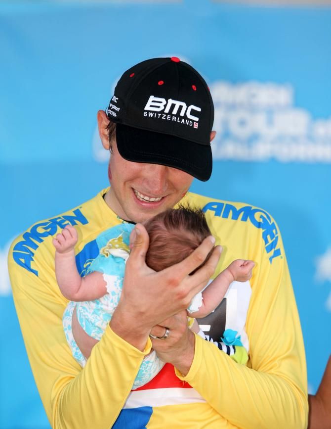 Tejay van Garderen (BMC) with his newborn child on the podium after winning the San Jose TT at California