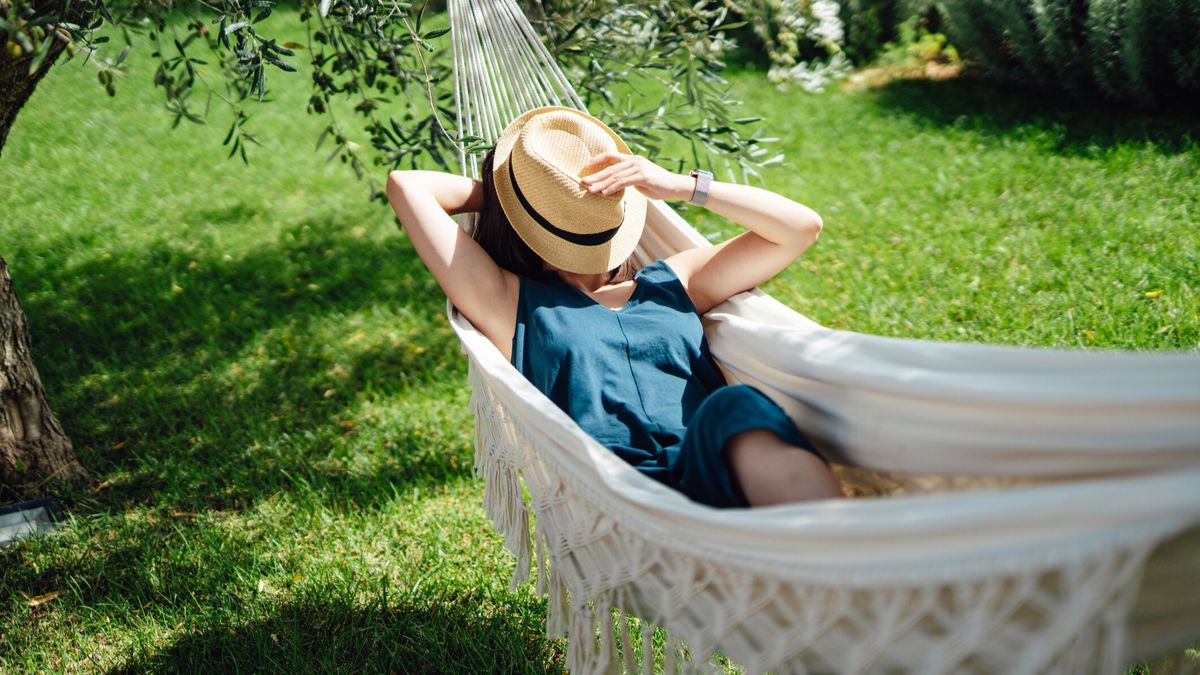 Woman lying in a hammock 