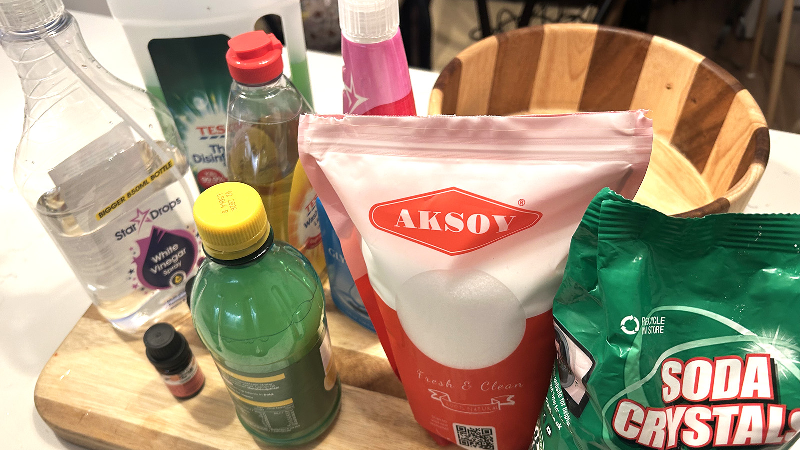 Homemade cleaning spray ingredients including baking soda and vinegar