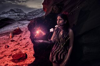 artwork of woman in otherworldly landscape