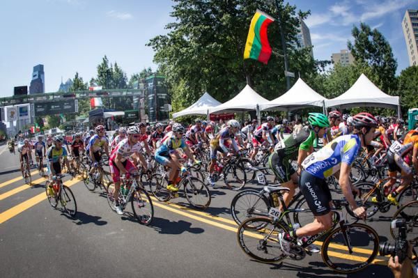 The men head through the finish line for another lap.