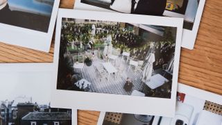 Instax Wide instant prints stacked on top of each other