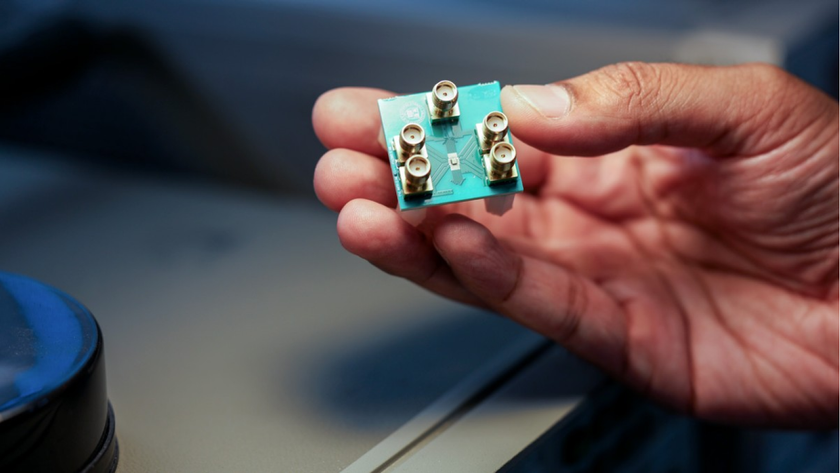 The low-power microchip in a person&#039;s hand.