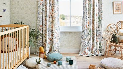 Nursery with wooden furniture and patterned curtains