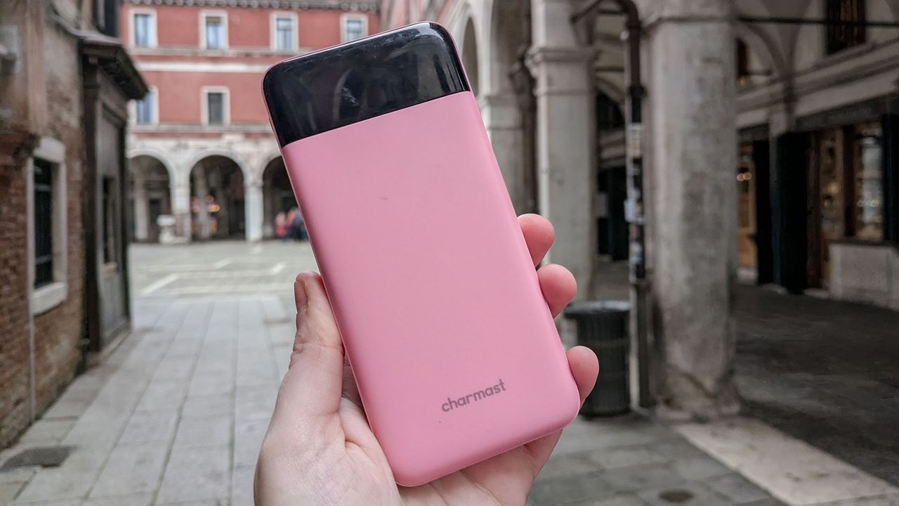 Holding a Charmast Portable Charger in Venice
