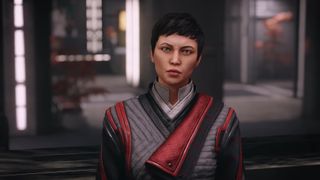Starfield - a Ryujin Industries character with short dark hair and a red and black uniform