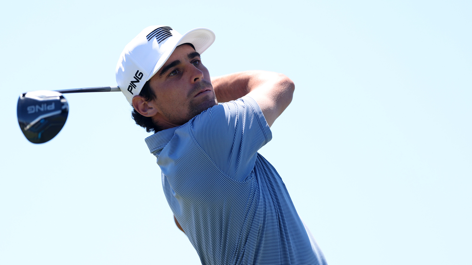 Joaquin Niemann hits a driver off the tee