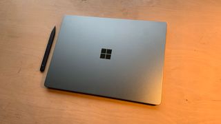Microsoft Surface laptop Go 3 closed with stylus