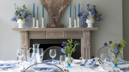 Table setting with white linens and blue and white floral tableware