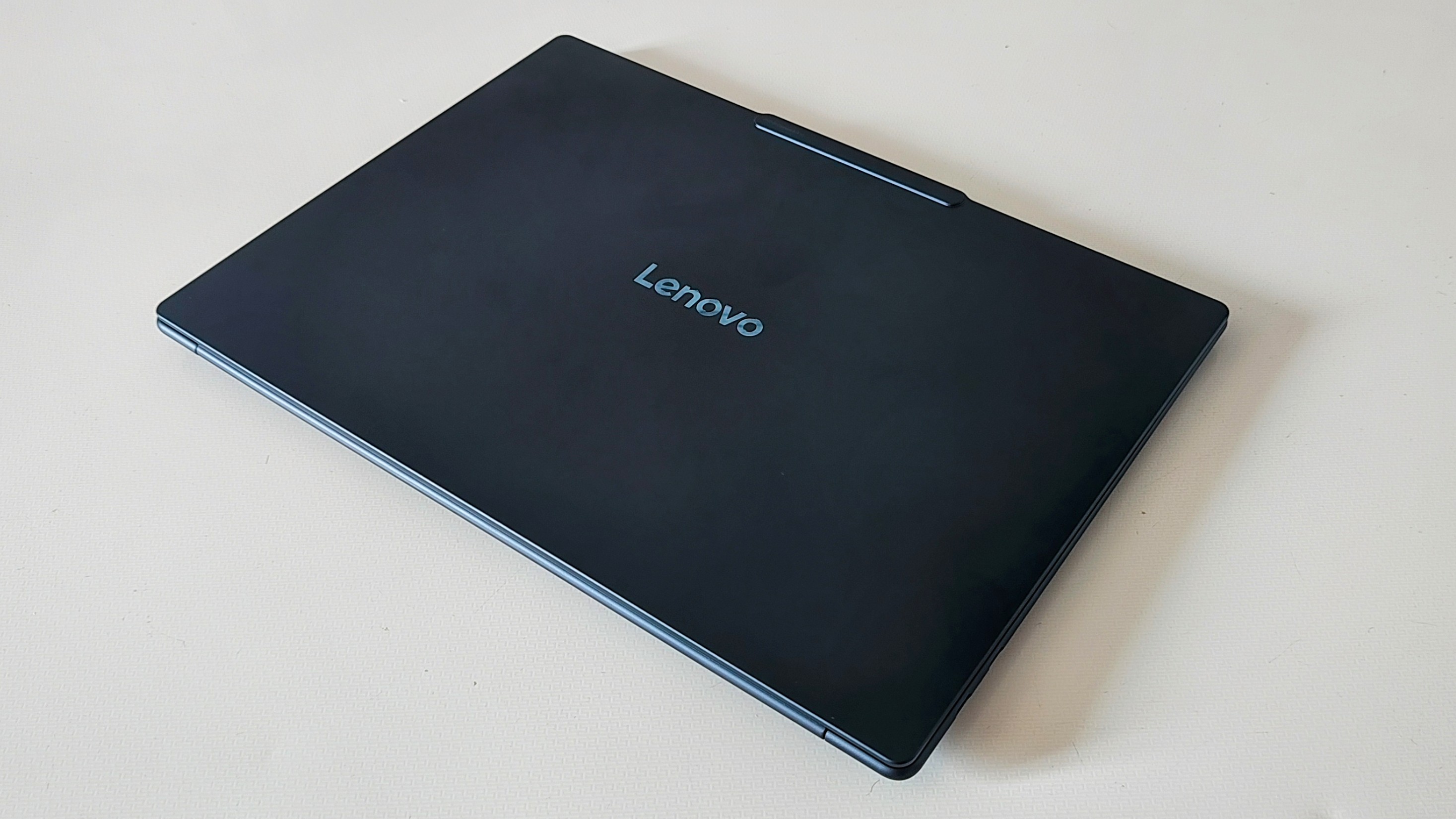 The Lenovo Yoga Slim 7x on a desk