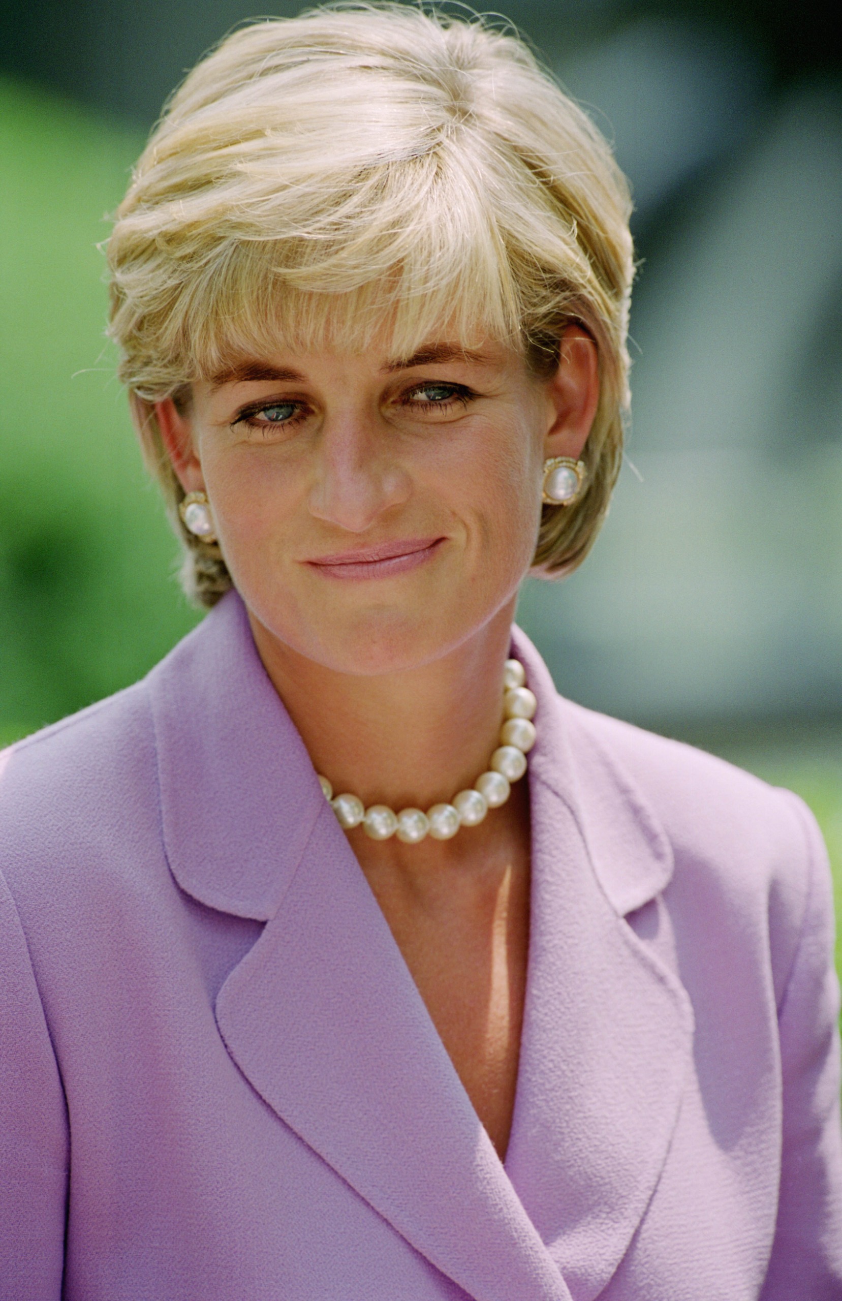 Princess Diana wearing a lavender blazer