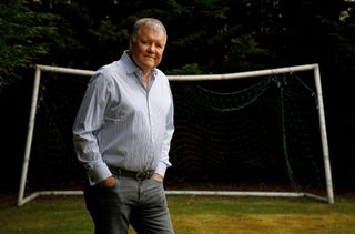 Clive Tyldesley, the football commentator, poses for a portrait in the garden of his home near Reading on April 29th 2021 in Berkshire